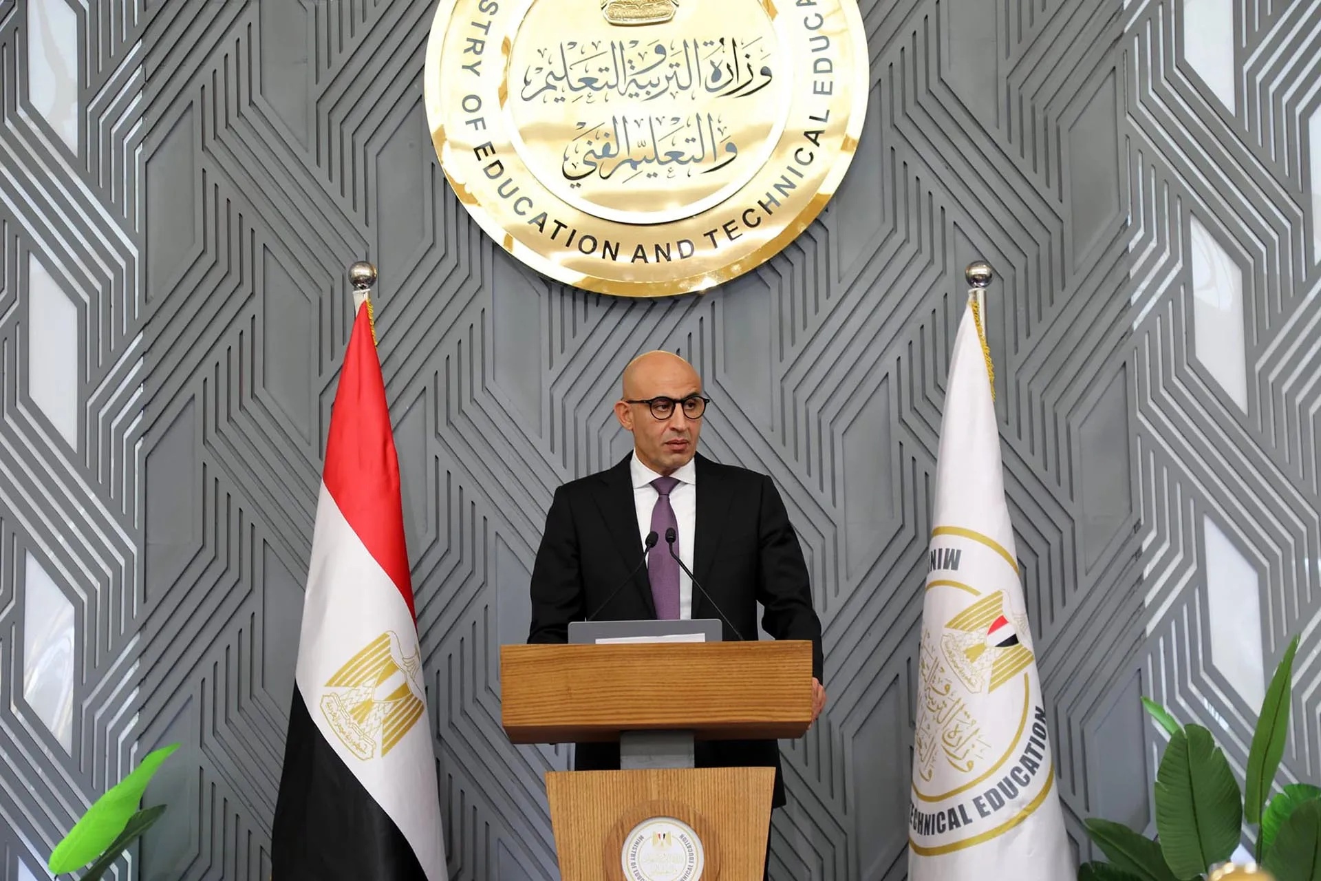 Education Minister Mohamed Abdel Latif speaks from a podium at Egypt's Ministry of Education
